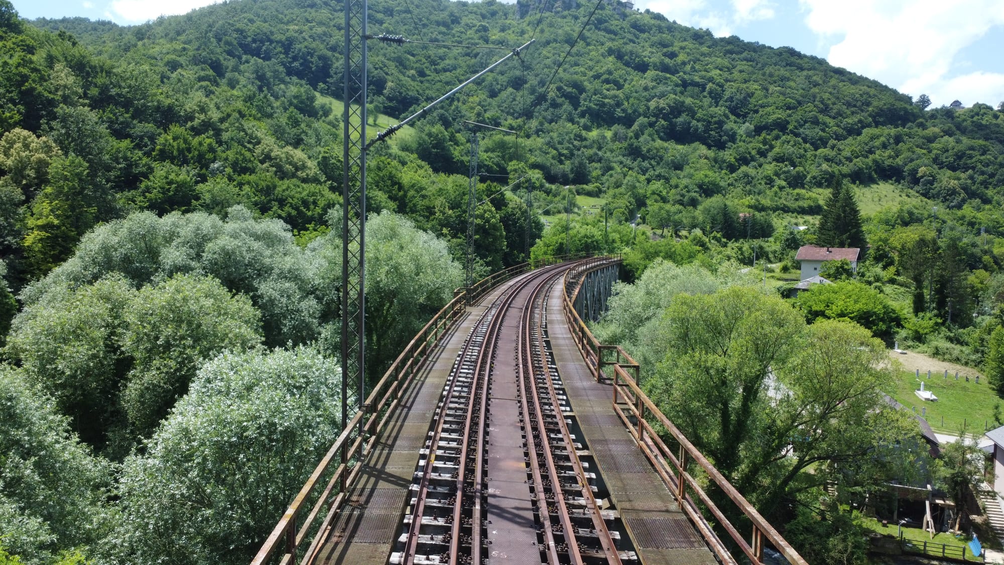Rusty tracks of a single track electrified section of the Una line, in Bosnia