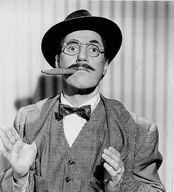 Groucho Marx with a top hat and cigar